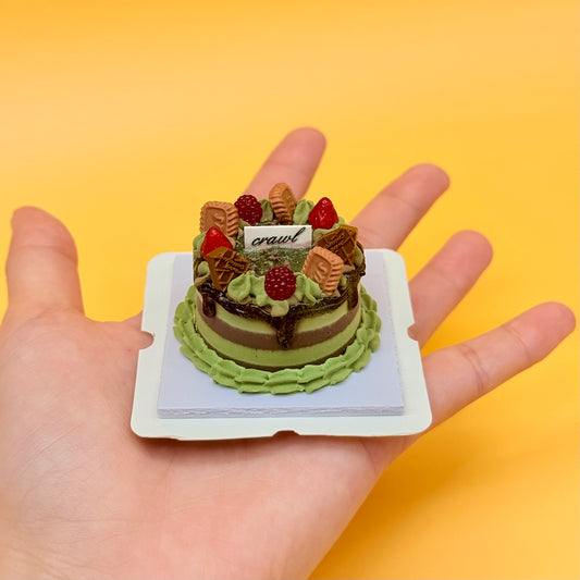 Mini gâteau décoratif fait main – présentation en main